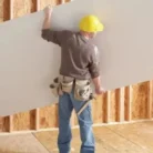 Drywall basement unloading labour service in GTA and Ontario – Reno Materials professional team unloading building supplies safely