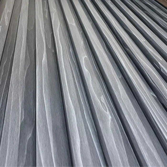 Dark Grey 4-Track Louver Fluted WPC Wall Panels installed on interior feature wall