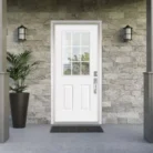 Installed 9 Lite Over 2 Panel Clear Glass Steel Exterior Door in residential entryway