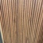 Red Cedar Vein 8-track fluted WPC wall panels feature wall