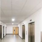 USG/CGC Radar Basic 2310 2x4 acoustic ceiling tiles installed in hallway lobby