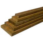 Bundle of pressure treated boards and lumber for outdoor construction projects