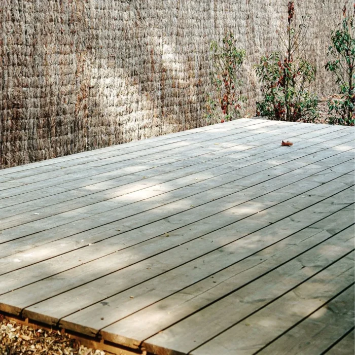 Older installed pressure treated 2 x 6 brown lumber deck and fence project Older installed pressure treated 2 x 6 brown lumber deck and fence project